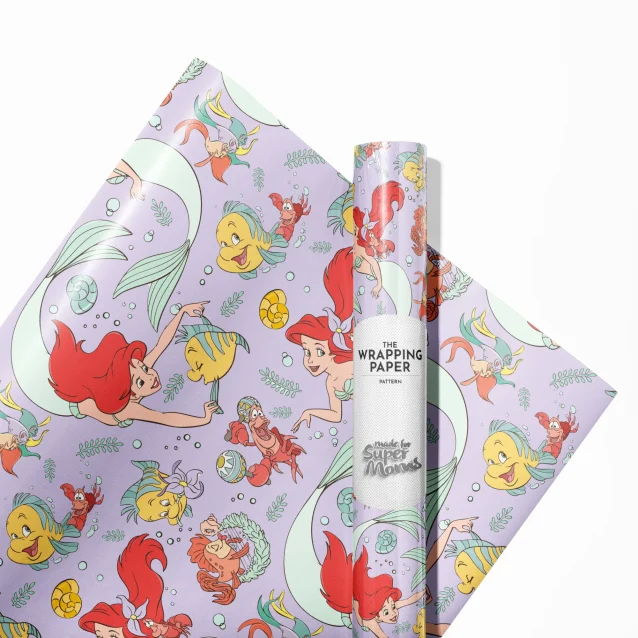 Ariel and Prince Eric share a romantic moment on a sheet of The Little Mermaid gift wrap, ideal for anniversary or Valentine's Day presents.
