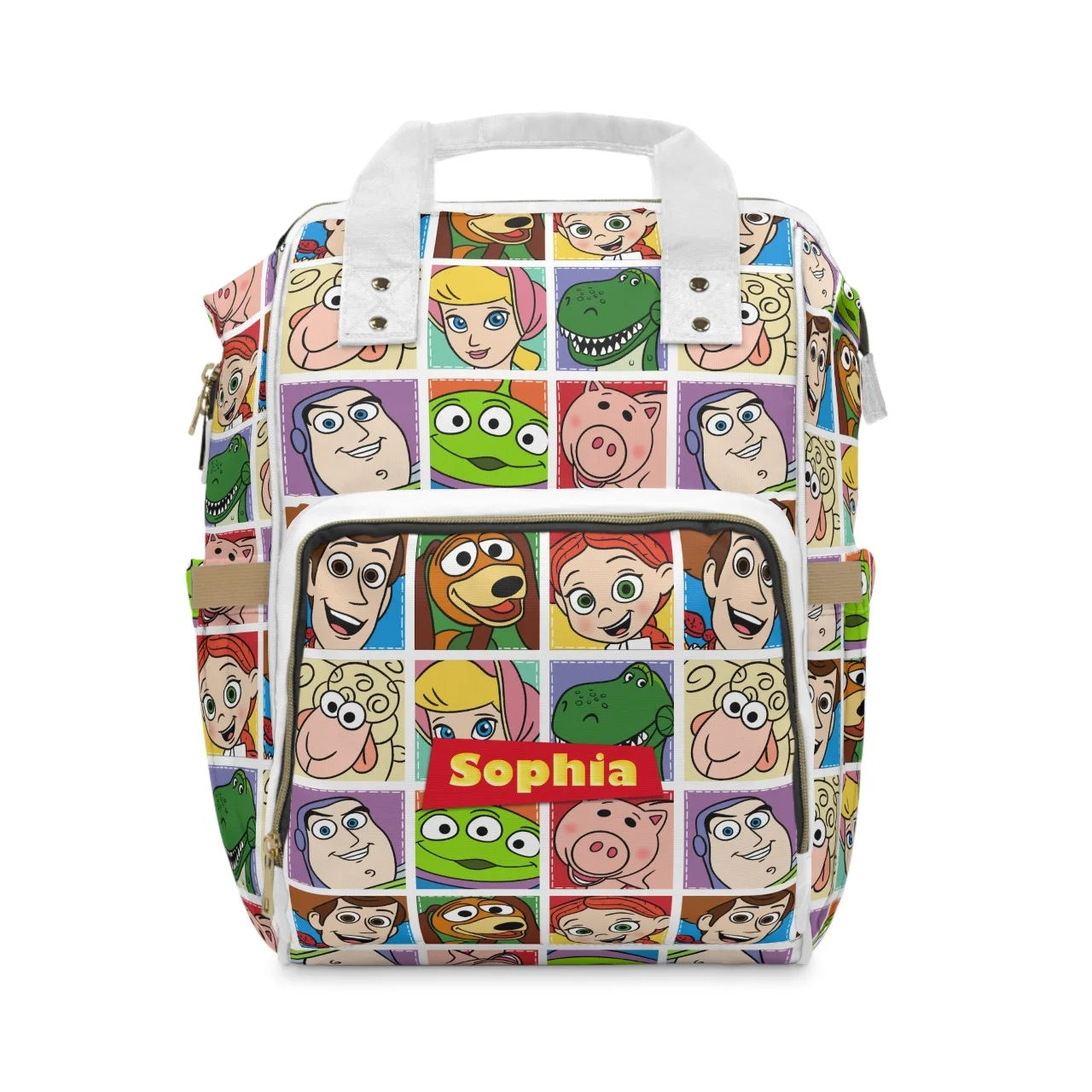 Spacious main storage compartment of the old-gold Andy's room travel daypack holding a plush baby blanket and toys.