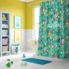 Vibrant Bluey Shower Curtain with [Child's Name if applicable, otherwise 'playful design'], made from durable 100% polyester, shown hanging in a bathtub.