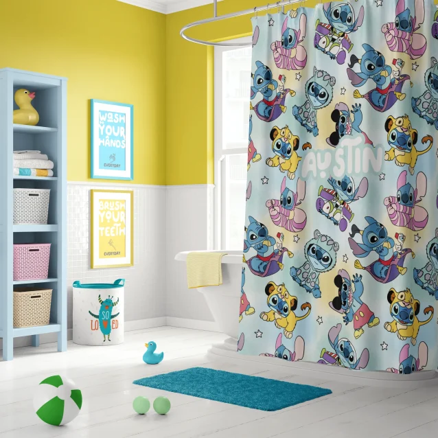 Lilo & Stitch kids shower curtain installed in a bathroom, with included C-shaped hooks visible.