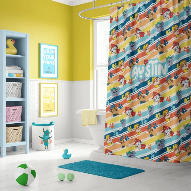Vibrant Paw Patrol shower curtain featuring Chase, Marshall, and Skye in an action scene, perfect for kids' bathrooms.