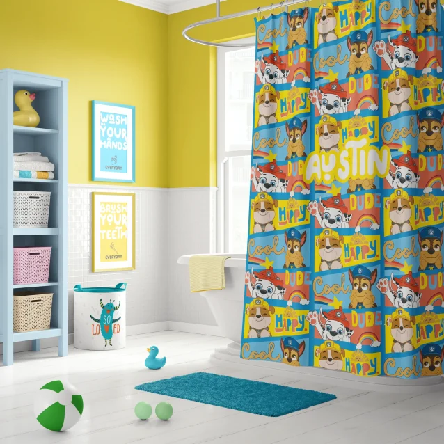 Close-up of the high-quality, vivid print on a Paw Patrol shower curtain, showcasing character details.