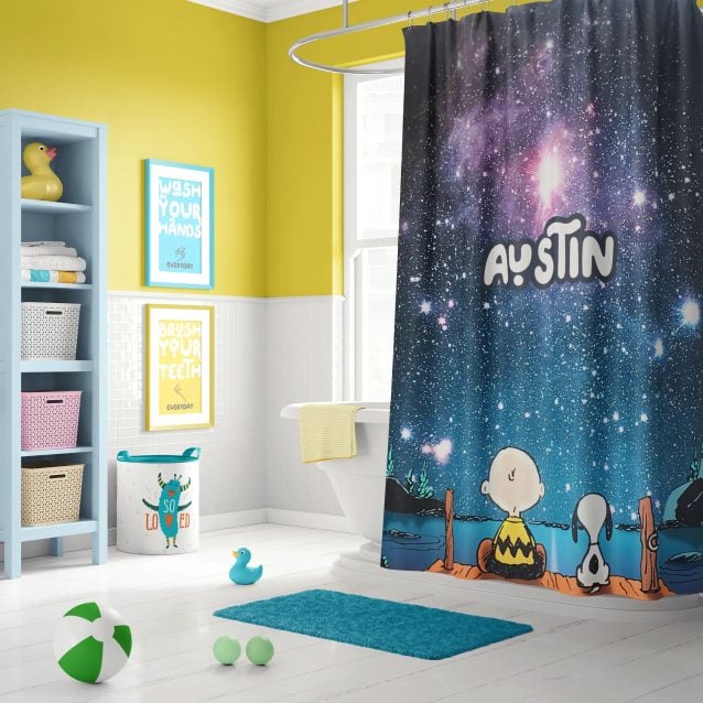 Snoopy shower curtain featuring Snoopy and Charlie Brown sitting together on a dock, gazing at the night sky.