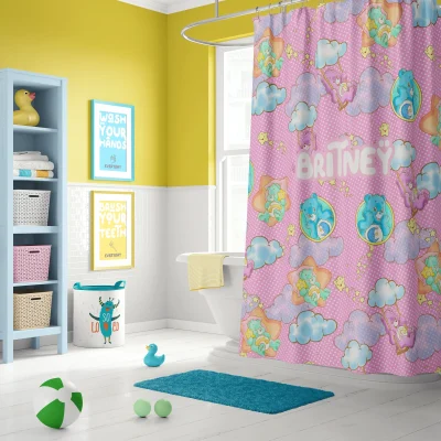 A close-up of the Care Bears shower curtain hanging in a clean, white bathroom.