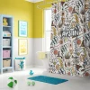 Hufflepuff shower curtain adding a cheerful touch to a bright, welcoming bathroom.