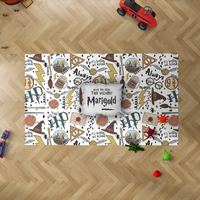 A young child playing with magical creature toys on the vibrant Harry Potter playroom rug.