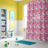 A bright and cheerful bathroom featuring a Sanrio character shower curtain.