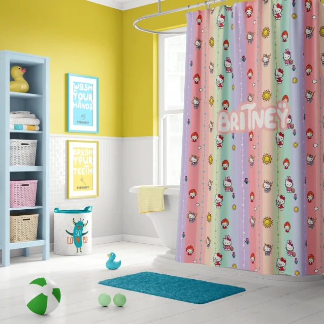 A complete Hello Kitty bathroom set with a matching shower curtain and bath mat.
