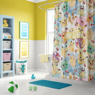 A boy's gamer-themed bathroom featuring a vibrant Pokemon shower curtain.