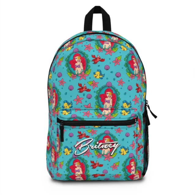 Front view of the custom personalized Little Mermaid school backpack for girls featuring an Ariel under the sea design and waterproof canvas.