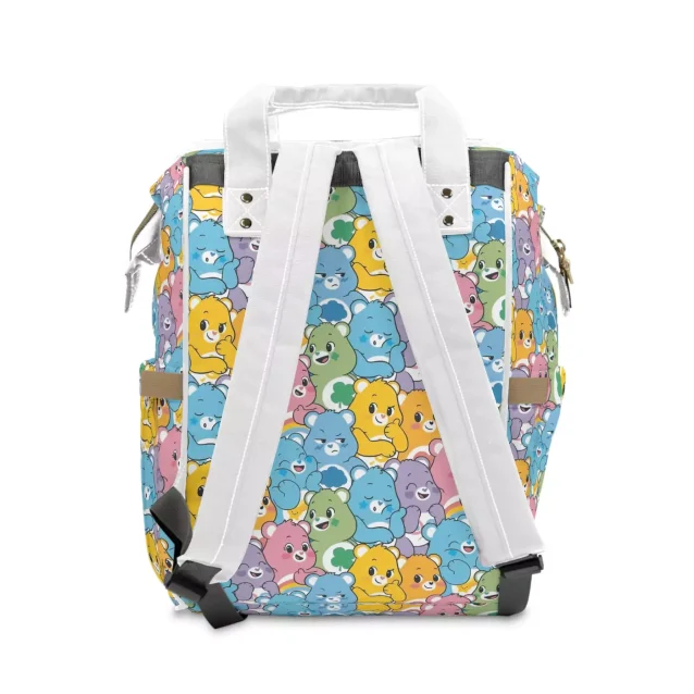 A close-up of the iconic Care Bears characters on the diaper bag.