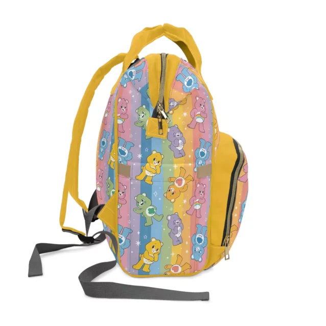 A comparison of the Care Bears diaper bag with a standard backpack to show its size.