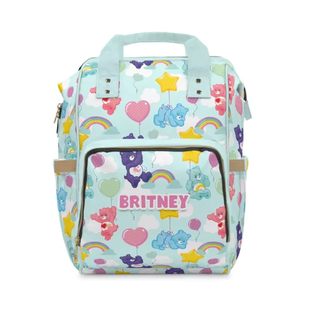 Mint green Care Bears diaper bag backpack with bears, hearts and rainbows, personalized with the baby's name.