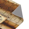 The Marauder's Map Rug displayed in a cozy reading nook, with a stack of Harry Potter books and a wand resting on it.