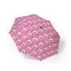 A child holding the cute Hello Kitty umbrella.