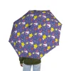 A collage of images showcasing the Hello Kitty umbrella in different settings.