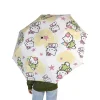 A lifestyle image of someone walking down the street with the Hello Kitty umbrella.