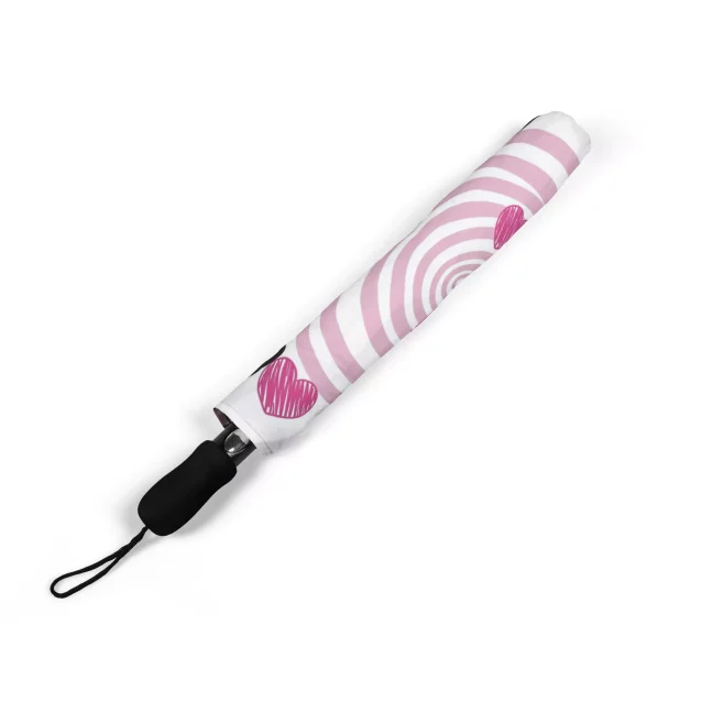 The automatic open and close button on the handle of the Hello Kitty umbrella.