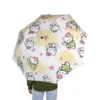 The Hello Kitty umbrella standing open to dry after a downpour.