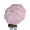 The Hello Kitty umbrella, personalized design, photographed open.