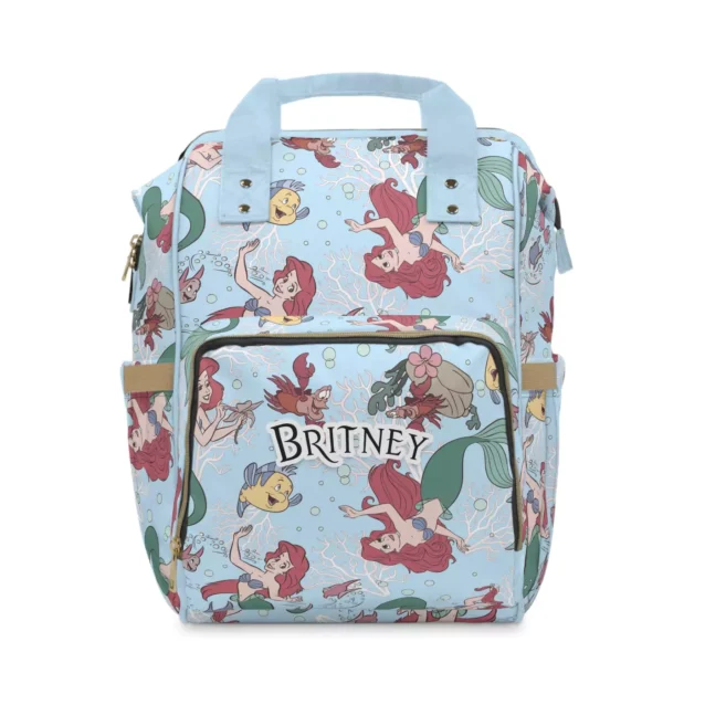 Light blue Ariel diaper bag with the watercolor Little Mermaid collage print.