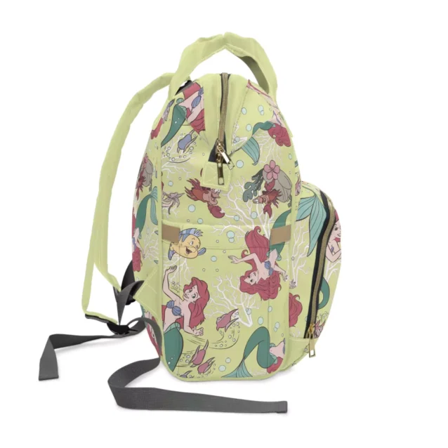 The empty Little Mermaid diaper bag, highlighting its structure and shape.