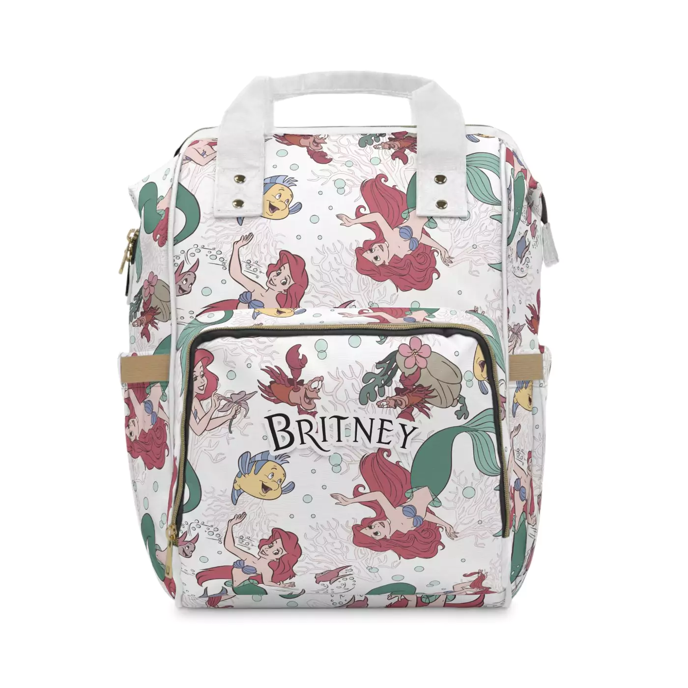 White Little Mermaid diaper bag backpack with a watercolor collage of Ariel and Flounder, the baby's name printed on the front pocket.
