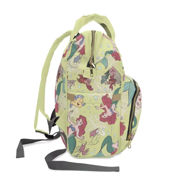 The empty Little Mermaid diaper bag, highlighting its structure and shape.