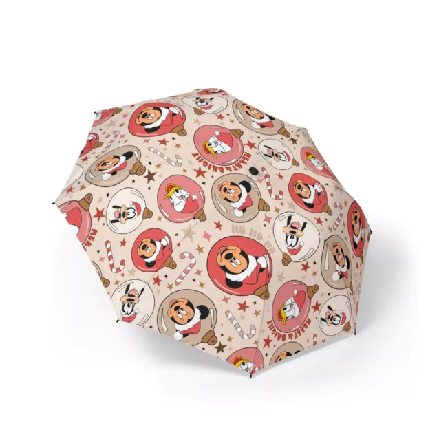 Mickey Mouse Christmas Mickey Christmas Baubles (Cream) umbrella held open in the rain.