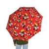 A personalized name printed on the Mickey Mouse umbrella canopy.