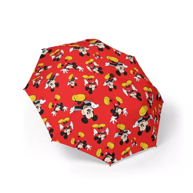 A Mickey Mouse umbrella printed with the Mickey on Red artwork.