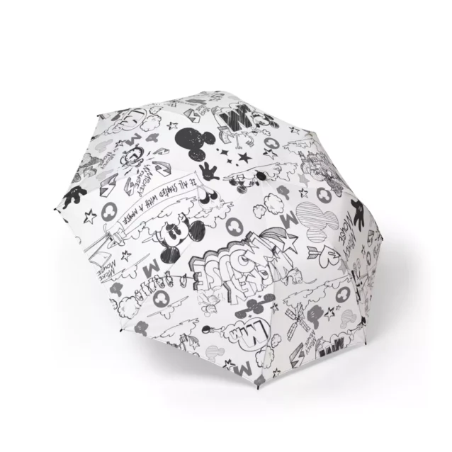 Mickey Mouse Vintage Mickey Comics (White) umbrella held open in the rain.