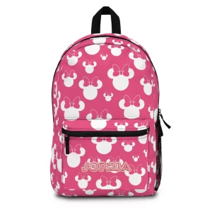 Front view of a personalized pink Minnie Mouse backpack for girls, featuring a large polka dot bow and a custom name.