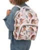 Moana diaper bag worn as a backpack, baby Moana and Hei Hei print.