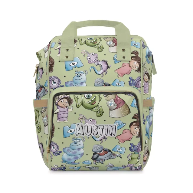 A lifestyle image of a family with the Monsters Inc. diaper bag.