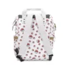 Back view of the white Pikachu diaper bag showing the padded back panel and adjustable shoulder straps.