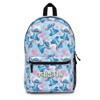 A personalized blue Stitch backpack for kids, featuring a tropical leaf pattern and a custom name for school.