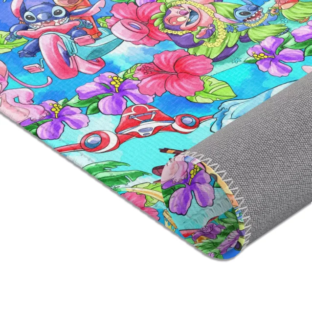 A custom Stitch rug with the name "Leo" printed on it, placed in a nursery.