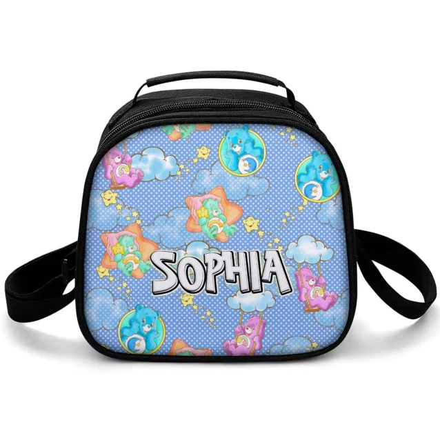 Blue Care Bears lunch box covered in bears, clouds and stars, personalized with a name in the chunky Care Bears lettering.