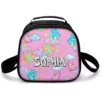 Pink polka-dot Care Bears insulated lunch bag with pastel bears drifting through clouds and stars, and a custom printed name.