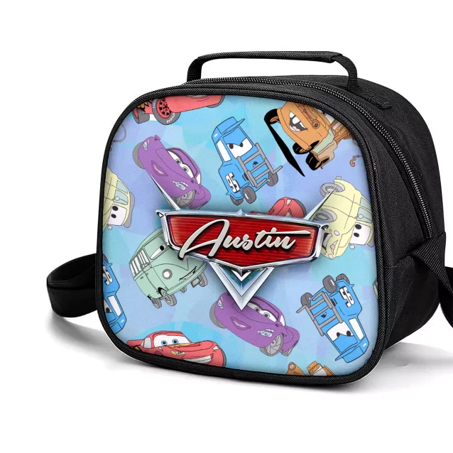 A detailed close-up of the durable, scratch-resistant polyester material of the Lightning McQueen lunch box