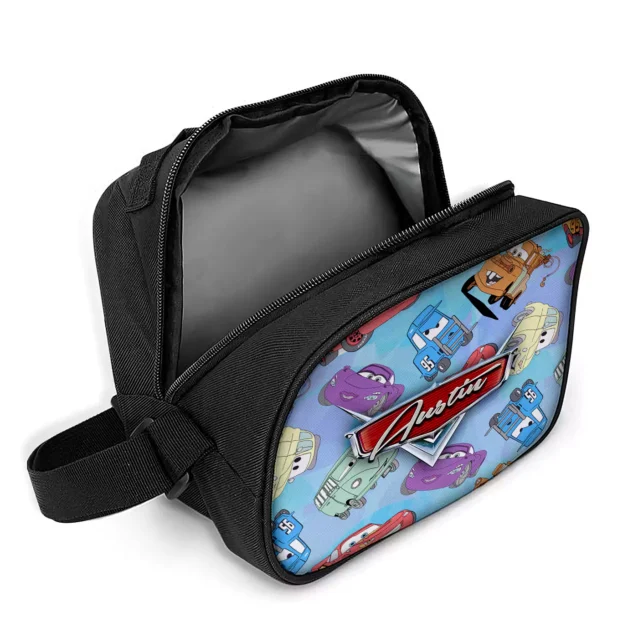 The Lightning McQueen lunch box unzipped, showing the food-safe aluminium foil lining that wipes clean and keeps school lunches fresh.