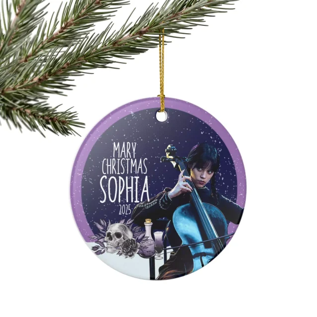 Wednesday Addams Christmas ornament hanging on a dark-themed tree.