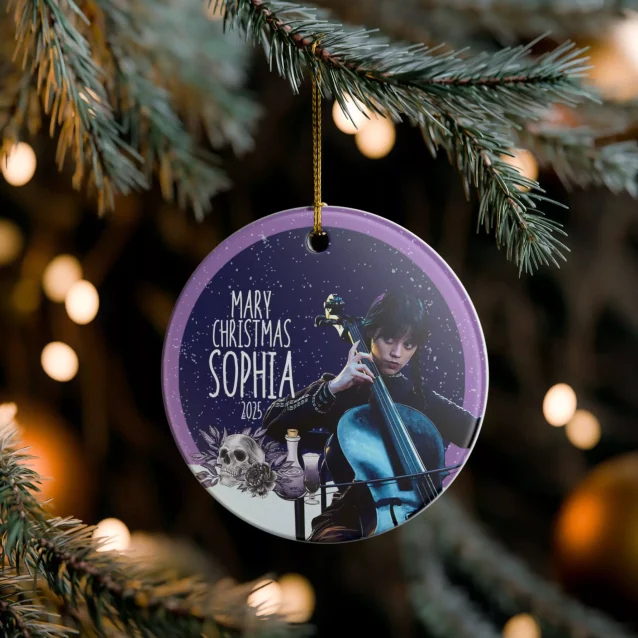 Close-up of the glossy ceramic finish on a Nevermore Academy crest ornament.