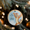Personalized Classic Winnie the Pooh Christmas ornament with custom name shown hanging on a festive tree.