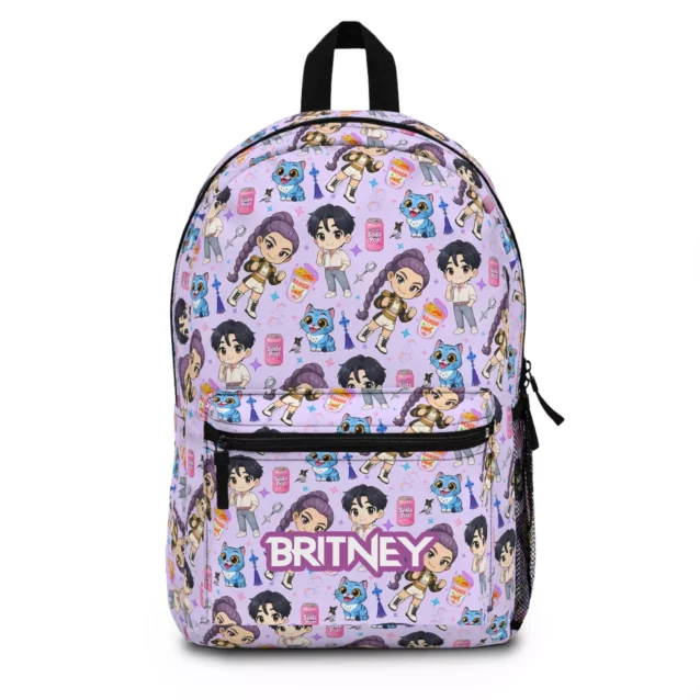 Lavender Kpop Demon Hunters backpack with the Huntrix and Saja Boys chibi toss — Rumi, Mira, Zoey, the Saja Boys and Derpy the tiger — personalized with the child's name.