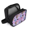 Open KPop Demon Hunters lunch bag showing the wipe-clean foil interior and the adjustable shoulder strap.
