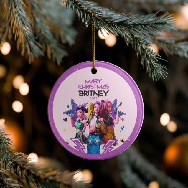Gothic Kpop Demon Hunters ornament hanging on a dark-themed Christmas tree.
