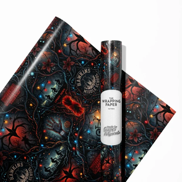 Personalized Stranger Things wrapping paper roll and a beautifully wrapped birthday gift featuring the iconic glowing red retro neon title text on a black background.