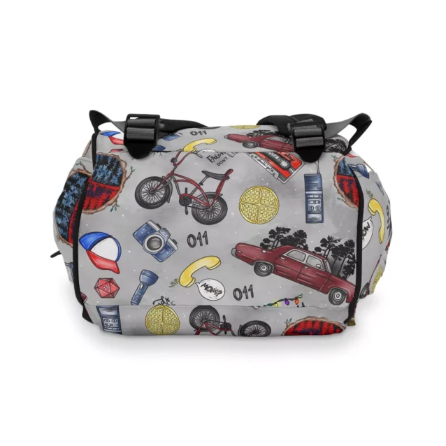 Side view of Stranger Things diaper backpack showing large water bottle pocket.
